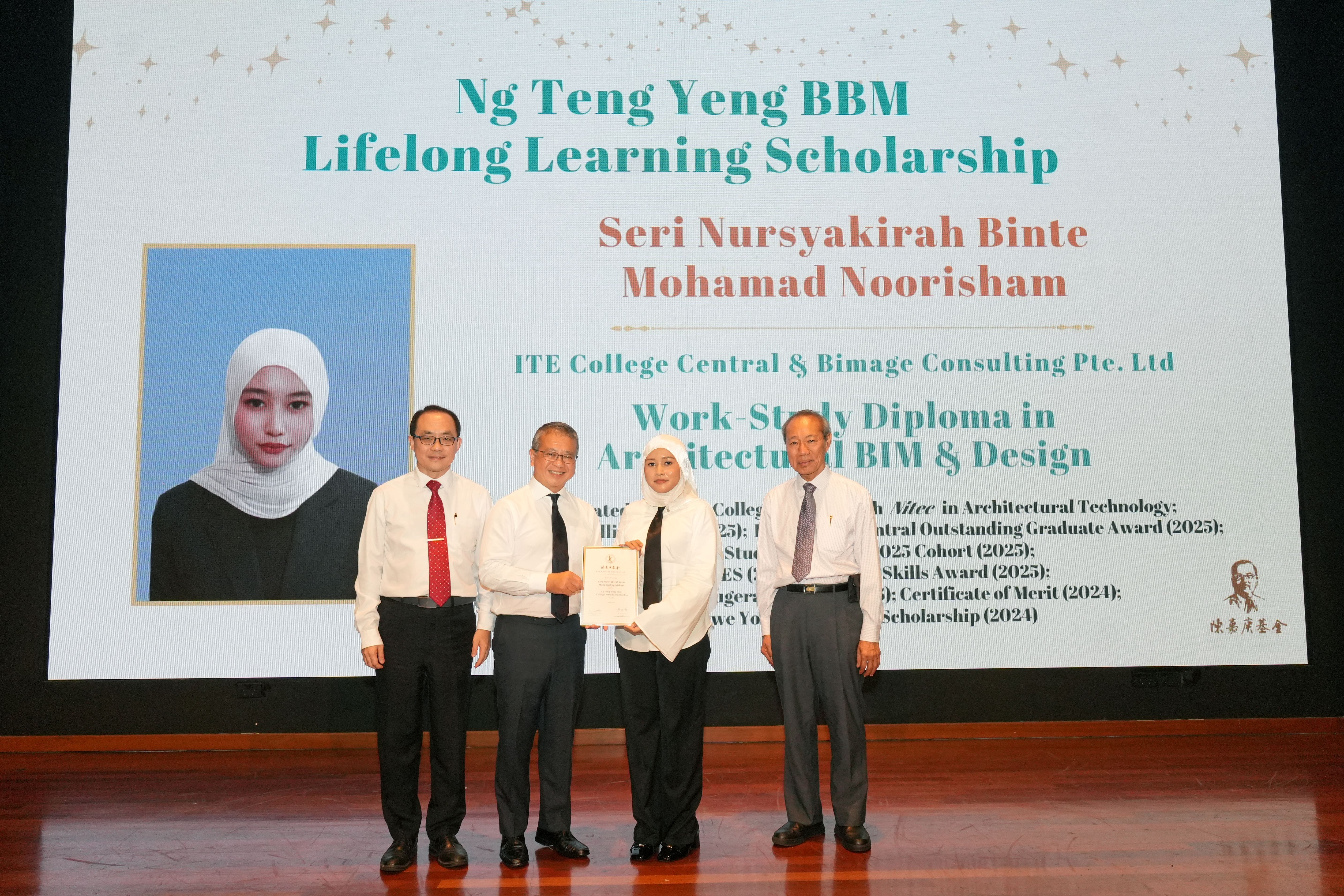 Recipient receiving scholarship on stage